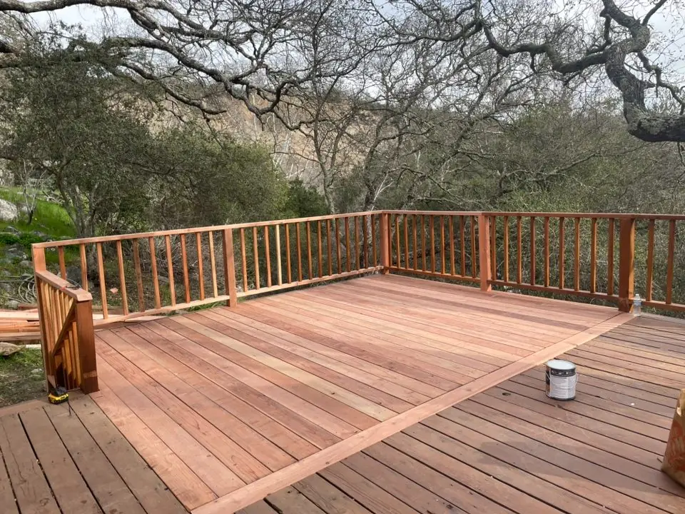 New redwood deck with railing